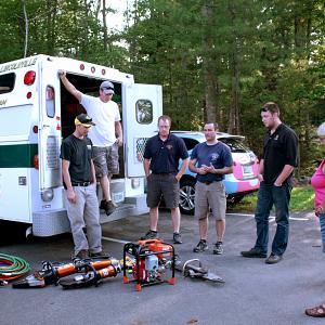 Members of the Lincolnville Board of Selectmen get a look at the new Holmatra extrication equipment that Lincolnville Volunteer Fire Department Inc. gifted to the town Monday night. (Photo by Holly S. Edwards)
