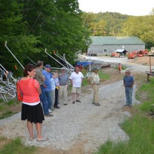 The Camden Select Board joins Snow Bowl crew to look over the state of affairs at the bottom of the mountain, July 13. (Photo by Lynda Clancy)