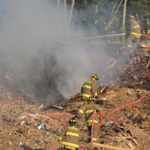 Rockport firefighters moved quickly Tuesday evening to put out a fire of unknown origin at the Midcoast Solid Waste Transfer Station. (Photo by Lynda Clancy)