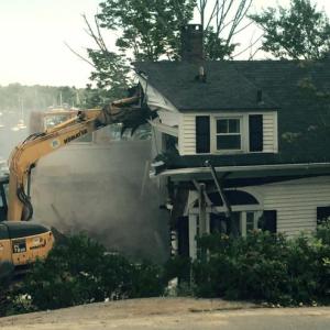 Joyce and Maynard Ingraham’s home is torn down Sept. 14. (Photo by Lynda Clancy)