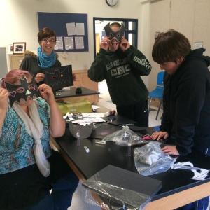 Medomak Middle School students show off their bat masks. (Photo by Madelon Kelly)
