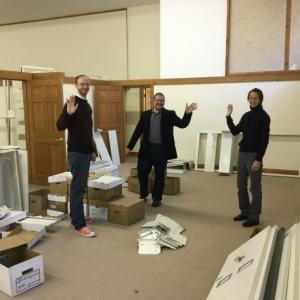 Waving from the children’s room of the new temporary library, L to R are, Ben Odgren, Ben Blackmon and Kim Slocomb. (Photo Courtesy of Amy Filley)
