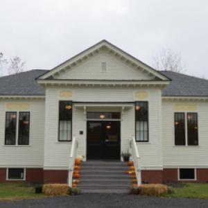 The three-room Unity Village School, built in 1898, once boasted more than 160 students. But in 1953, the town erected a new and larger elementary school across the street. The building then remained vacant for 6 decades, and fell into serious disrepair before Maine Farmland Trust bought the building as a home for the Unity Food Hub.