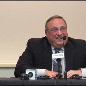 Maine Governor Paul Lepage smiles as he talks to people at Rockland’s City Hall.