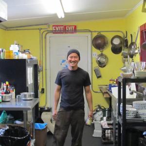 Pho Sizzle owner Tom Pham in his new working space on Leland Street in Rockland. (Photo by Kay Stephens)