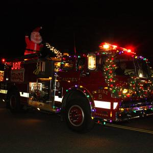 Fire engines from Rockport and Lincolnville jointed Camden Fire Department in participating in Friday night’s annual Christmas by the Sea parade through downtown Camden. (Photo by Holly S. Edwards)