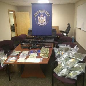Maine Drug Enforcement Agency seized, drugs, money, guns and trucks in Orland heroin bust Monday, Dec. 21. (Photo Courtesy of MDEA)