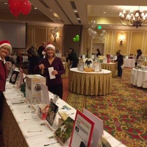 Paws Auction volunteers ready the room for bidders. (Photo Courtesy of P.A.W.S.)