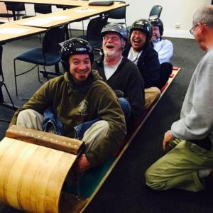 Rockport Select Board members get seriously ready to challenge the Camden Select Board down the chute. (Photo by Lynda Clancy)