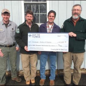 Morgan York, ranger at Mt. Battie State Park; Steve Richardson, Maine Bureau of Parks and Lands Senior Forest Engineer; Randy Stearns, Friends of Mt. Battie Tower; and Michael Leighton, Northern Regional Manager Parks and Recreation for the State of Maine.