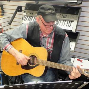 Rosey Gerry of Rose amd The Wayfaring Strangers, kept things moving and lively Friday night at K2 Music (Photos by Chris Wolf)