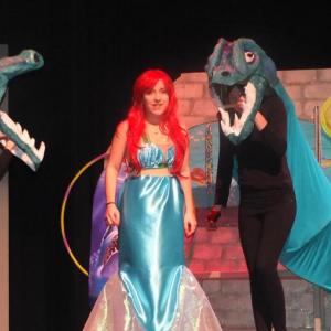 Kate Upham, Annabel Milisa-Parker and Robyn Walker-Spencer try to turn the little mermaid to the dark side. (Photos by Chris Wolf)