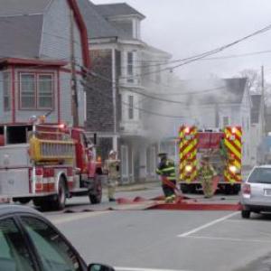 The March 17 fire at an apartment building drew firefighters from surrounding towns to assist. (Photo by Sarah Thompson)