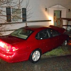 Rockland Police had to search for the driver of this 2003 Ford Taurus after they fled following a crash into this building and its attached ramp at the corner of Union and Myrtle streets. (Courtesy Rockland Police Department)