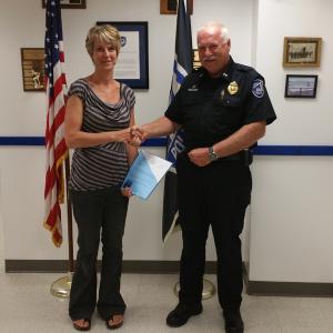 Rockport resident Raeanna Fraser and Rockland Police Chief Bruce Boucher.