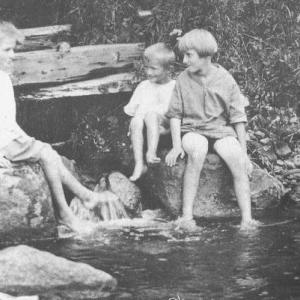 Alwilda Ames, left, and her little brother Robie sitting next to Connie Ames. The children grew up on opposite sides of Atlantic Highway, running back and forth to play together all summer long.
Photo courtesy of Lincolnville Historical Society ames and wades