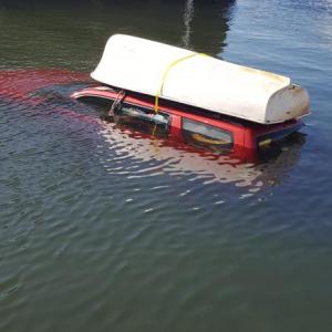It was an unlucky day for a Belfast boater Aug. 19, at the city’s landing, when his car rolled backward into the bay. (Photo courtesy Belfast Police Department)
