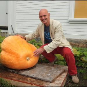 David Troup of the Farnsworth shows off his pumpkin pride as he poses with his homegrown gourd. (Photos by Chris Wolf)