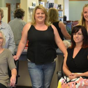 Jeanne Butler (seated at left) has sold the Cutting Edge to Amy Judkins (seated at right). Dodie Leavitt, Melanie Esancy and Sarah Haskell will continue to cut and style hair there, as will Butler and Judkins.
