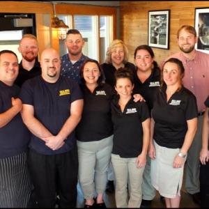 Staff fm Sea Dog welcomes patrons to the Community Bar-B-Q. Jennifer Sanderson, Joe McBrady, Ryan Stockburger, Amanda Dennison, Jessica Sinclair, Ali Simonds, Teresa Mastricolo, Sara Stine, Jessa Hardie, Christine MacWilliams, Matthew Booth, Connor Scott and Shelly Trich (Photos by Chris Wolf)