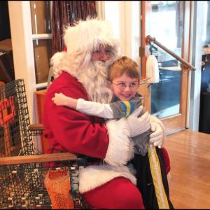 Lots of love for Santa on Sunday morning in Rockland. (Photo by Chris Wolf)