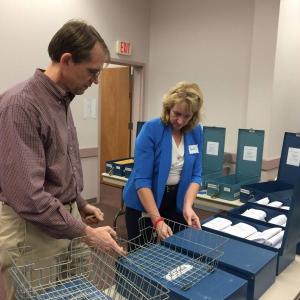 Recount of Question 2 ballots begins Thursday; Question 1 begins Monday. Question 1 would legalize marijuana for recreational use by adults 21 years of age or older. Official election night results show a difference of 4,073 votes. Question 2 would institute a 3 percent tax on individual Maine taxable income above $200,000 to go toward education expenses. Official election night results show a difference of 9,580 votes. Elections Division employees Jon and Heidi open ballot boxes for the recent House recount.