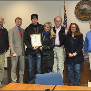Noah Ames (center) with his wife Jennifer accepts a commendation form the Rockland City Council Monday, Dec. 12. Appearing in the photo is counsilors Ed Glaser, Mayor Will Clayton, Larry Pritchett, Valli Geiger and Adam Ackor. (Photos by Chris Wolf)