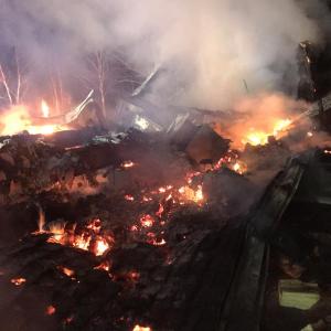The early morning fire at the home of 64-year-old Bruce Fales, on Vinal Street in Rockport, early Tuesday morning completely destroyed the residence, partly because it was so far along by the time it was spotted by a young neighbor boy who woke up and saw the flames through the woods. (Courtesy Rockport Fire Department)
