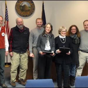 Rockland City Council members present commendations for work on the Edna St. Vincent Millay House. From left, councilors Laryy Pritchett and Ed Glaser, Mayor Will Clayton, Michelle Gifford and Ann Morris, and councilors Valli Geiger and Adam Ackor. (Photo by Chris Wolf)