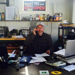 Chris Morong, owner of Mt. Battie Carwash, in Camden, figures he has spent more than 200 hours scrutinizing the redevelopment finances at the Camden Snow Bowl, and he still has questions. (Photo by Lynda Clancy)