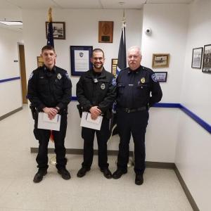 From left, Officer Addison Cox and Officer Alexander Gaylor, receive the Rockland Police Department’s “Meritorious Service Award” from Chief Bruce Boucher. Not pictured is Sgt. Matthew Lindahl, another recipient of the award. (Photo courtesy of Rockland Police Department)