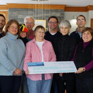 Businesses involved in the 13th Annual Pies on Parade Tour gathered on Wednesday, February 8, 2017 to deliver a check to the AIO Food Pantry. Included in the check presentation were the following people: Cyndi Ostrowski (Inns at Blackberry Common), PJ Walter (LimeRock Inn), Joan Lemole (The Penobscot Language School), Carney Doucette (Maine Coastal Island National Wildlife Refuge), Ted Weiss (Hawthorn Inn), Marty Shaw (AIO Food Pantry), Charlie Page (Maritime Energy), Jean Thompson (CMCA), Chris Seavey (Maritime Energy), Cheryl Michaelsen (Berry Manor Inn), Edwin Hantz (Granite Inn). (Photo courtesy PJ Walter/PJ Walter Photography)