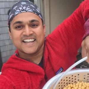 Arif Shaikh preparing vegetable curry inspired by the flavors of his family’s region of Kolkata, India.