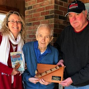 From left, U.S. National Toboggan Committee chairman Holly S. Edwards, Jack Williams, Toboggan Committee co-chairman Stuart Young.
