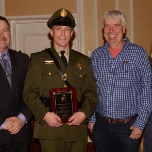 Maine Marine Patrol Officer Brendan Bezio (center) receives his officer of the year away March 4. With him are Marine Patrol Colonel Jon Cornish (left), MLA Board President David Cousens (2nd from right), and MLA Executive Director Patrice McCarron (right). (Photo Courtesy of Mark Haskell Photography)