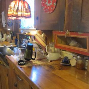 My fully-functional kitchen counter; notice that there are no mice scurrying about, nor is there a wolf spider lurking behind the faucet, the drawers slide open at a touch, and the cupboard doors latch.
Photo by Diane O’Brien kitchen