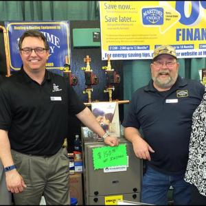 Maritime Energy are all smiles and fun at the Expo. Left to right: Chris Seavey, Charlie Page, Scott Robertson and Kim Graffam
