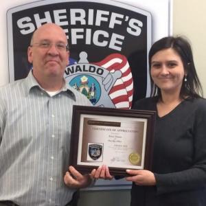 Waldo County Sheriff’s Office Chief Deputy Jason Trundy and PenBayPilot.com writer Erica Thoms, April 4, on Hug an Newsperson Day.