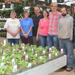The Guini Ridge Farm crew is ready to open in Rockport, at the former Hoboken Gardens greenhouse and nursery spot, on Route 1, near the intersection of Pascal Ave. The crew in the photo consists of Nancy Barker; Mary Heckman, Wendy, Bruce and Daniel Reinemann; Paul Kraemer and Trina DiMarzo. (Photo by Lynda Clancy)