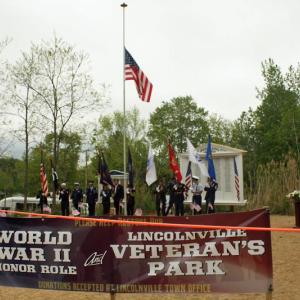Gathering at the Honor Roll on Memorial Day in 2016 to lay a wreath, pay respects. (Photo by Holly S. Edwards)