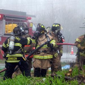Firefighters participating in training sessions leave no centimeter of skin exposed. (Photo by Sarah Thompson)
