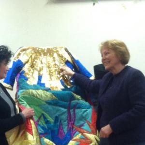 Head costumer Sheilagh Guyer, and Ursula Kruse-Vaucienne, of the production team for ‘Joseph and the Amazing Technicolor Dreamcoat,’ consider costumes for the summer show. There are still ways for community members to become involved.