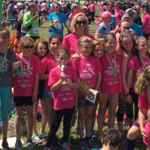 Members of the autumn Midcoast Girls on the Run team pose for photos during the Maine Girls on the Run 5K. (Photo courtesy of Caroline Moore)