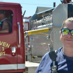 Vinalhaven Firefighter Jessica Martin was with nine other of her fellow firefighters spending much of Sunday in training on the island. In the truck is Deputy Chief James Harris. (Photo by Lynda Clancy)