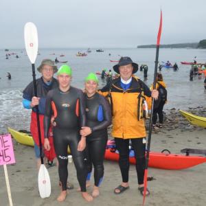 Swimmers and their paddlers take to the ocean Aug. 19 for the fifth annual Islesboro Crossing, a fundraiser for LifeFLight of Maine. (Photo by Lynda Clancy)