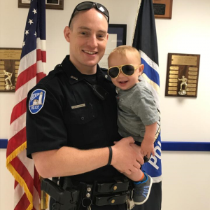 Rockland Patrol Officer Scott Redmun and his son. (Photo courtesy of Rockland Police department)