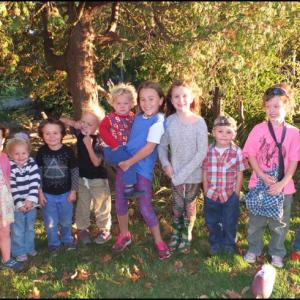 Young children enjoyed the perfect fall weather outside as parents enjoyed the social hour.