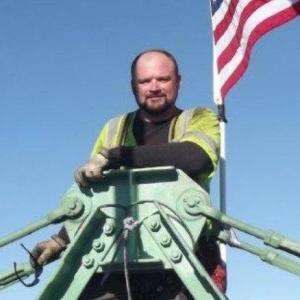 Adam D. Purrington.