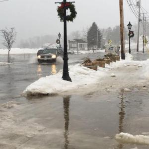 At high tide: ice floes and six inches of water flood Route One on Lincolnville Beach. (Photo courtesy The Whale’s Tooth Pub via Facebook)