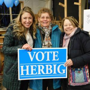 House Majority Leader Erin Herbig, D-Belfast, stands with two supporters -
Sharon Goguen, of Belfast, (center) and Diana Hauser, of Unity (right).
(Photo by Erica Thoms)
